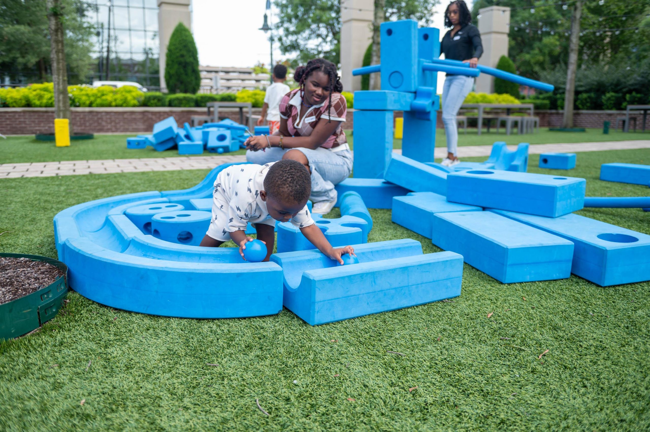 Families participate in free creative play sessions inspired by the Columbia Museum of Art.